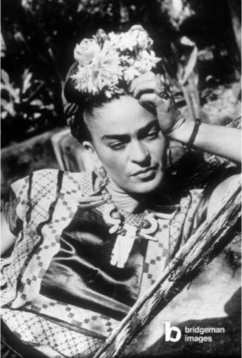 Mexican painter Frida Kahlo in a hammock