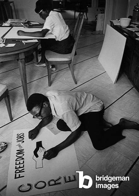 CORE workers making signs, 1960-69 (b/w photo) / Courtesy of the Amistad Research Center, New Orleans, LA / Bridgeman Images