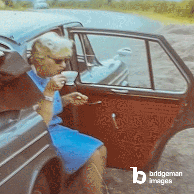 United kingdom 1966, Old lady drink tea in car / Private Collection / 4K Historical Footage / Bridgeman Images
