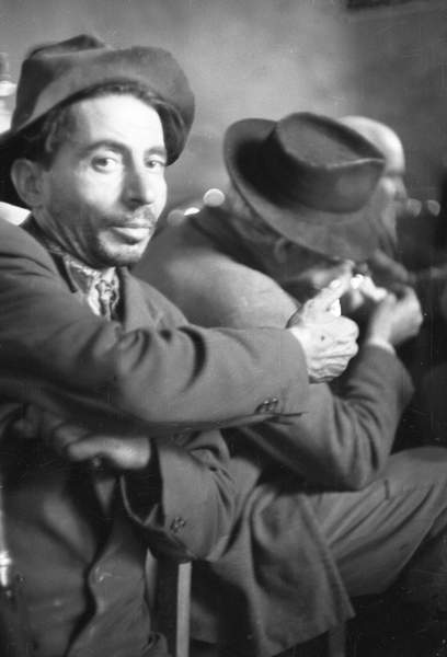 Men during a meeting of "Federbraccianti", CGIL, Melissa, Calabria, 1950 (b/w/ photo) Ando Gilardi / Fototeca Gilardi / Bridgeman Images