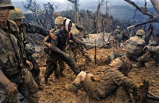 photo from Vietnam war: Reaching Out (Operation Prairie, Mutter Ridge, Nui Cay Tri), Vietnam, October 5, 1966 (dye imbibition print, printed c.1997), Larry Burrows (1926-1971) / Museum of Fine Arts, Houston, Texas, USA / Museum purchase funded by David and Stephanie Mundy in memory of Joe Mundy, who served in the U.S. Armed Forces in Vietnam / Bridgeman Images