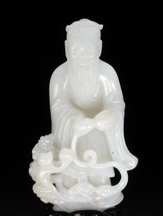 Dong-Fang Shuo tenant sa gourde vide d’où emerge des nuages lingzhi, un singe offrant une pèche à son pied, période Kangxi, 1662-1722, porcelaine, Dynastie Qing